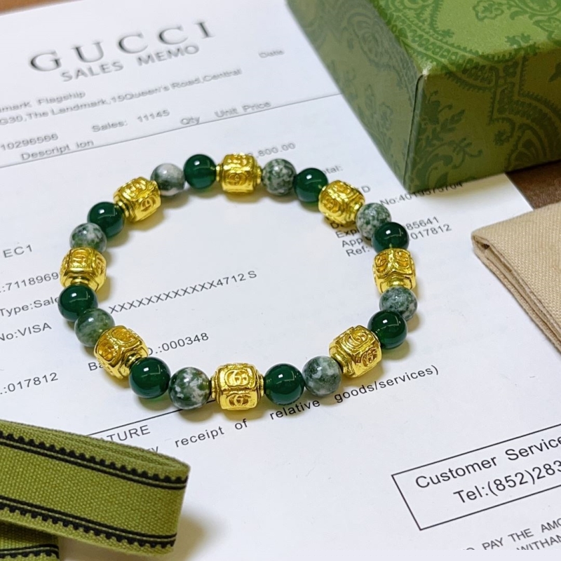 G*u*i bracelets